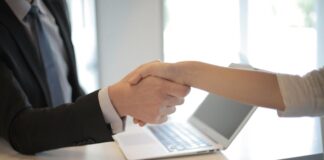 Person in Black Suit Hired An Employee